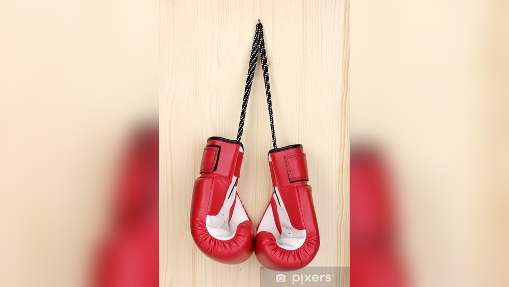 How to Hang Boxing Gloves on Wall