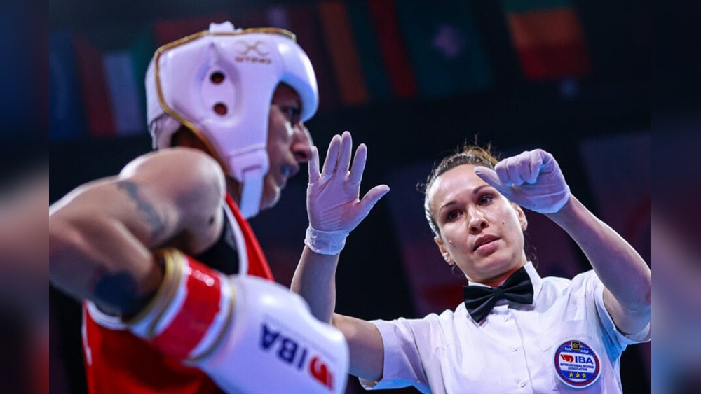 Why Do Boxing Referees Hold Gloves